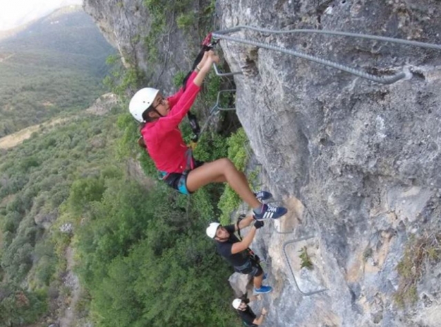  Holding onto the ferrata clamps